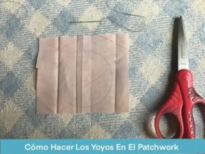 Hacer Yoyos Para El Patchwork - Circulo marcado sobre una pieza de tela color rosa